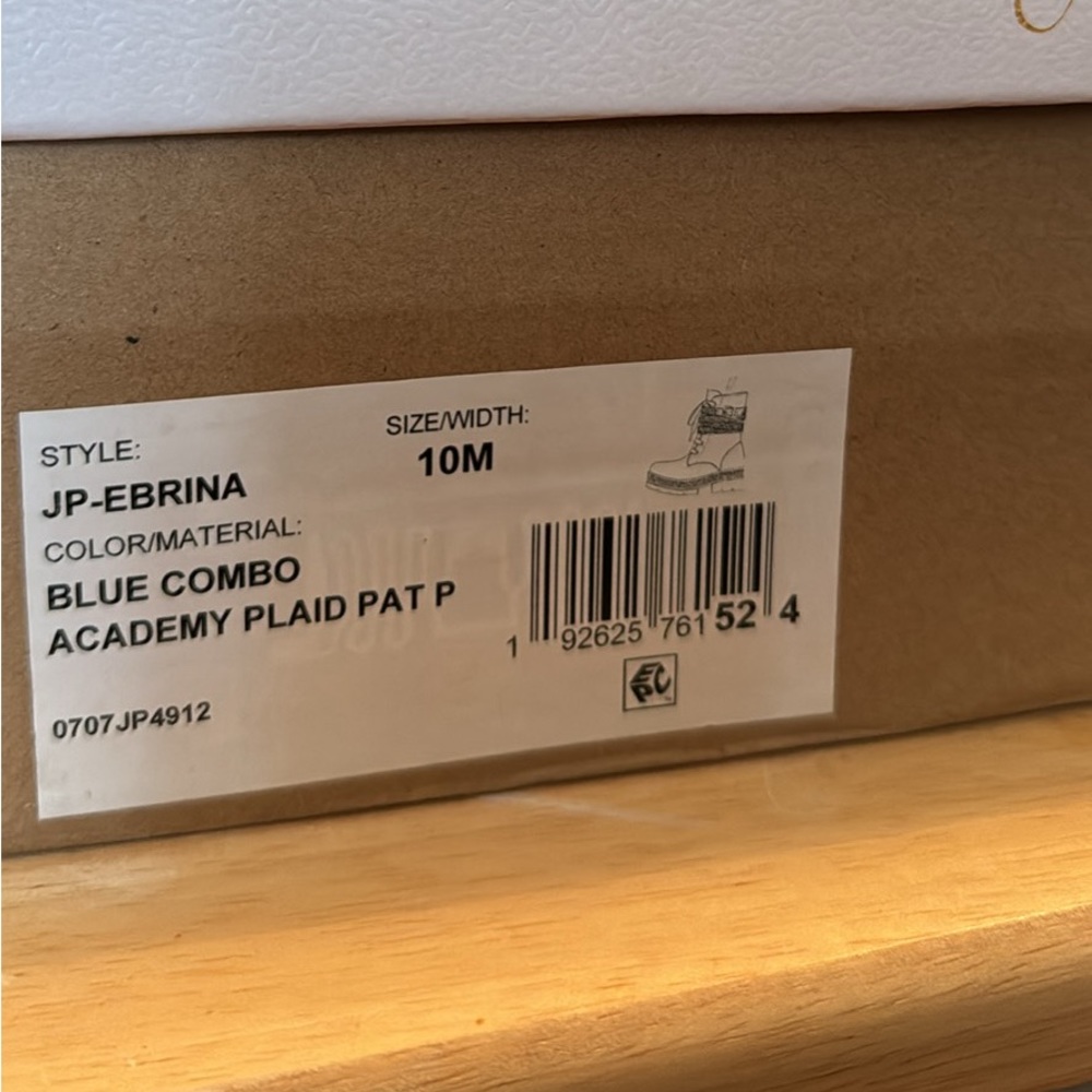 Brand new, never worn Jessica Simpson Academy plaid boots.